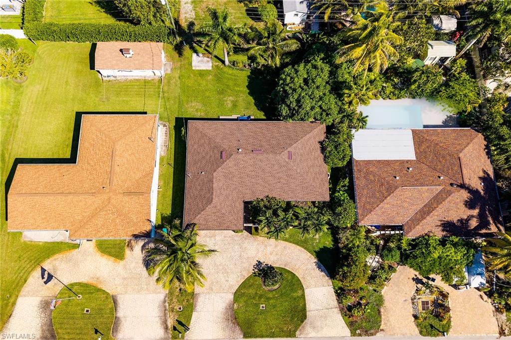 1337 Wisconsin Drive Naples, FL 34103 - Photo 35 of 35 an aerial view of a house with swimming pool and sitting space