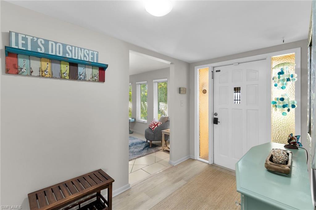 1337 Wisconsin Drive Naples, FL 34103 - Photo 4 of 35 a bedroom with furniture and a window