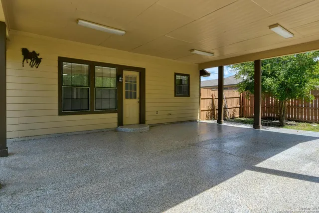 a view of backyard with green space