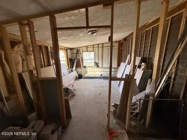 a view of living room with a floor to ceiling window