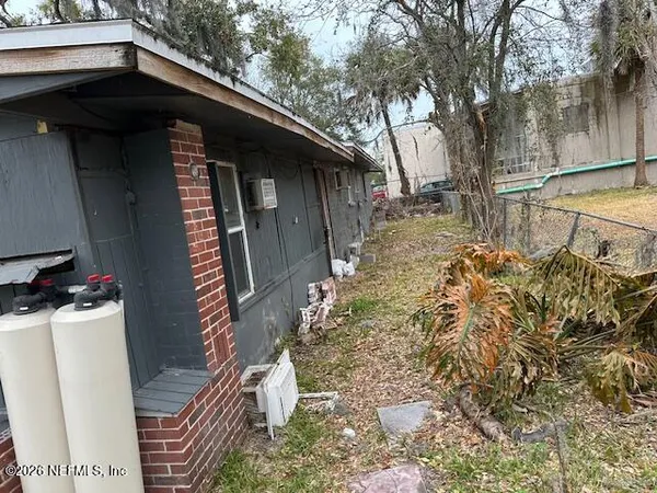 a house with trees in front of it