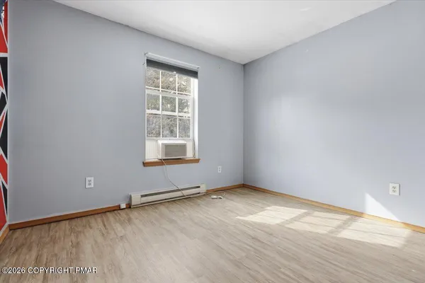 a view of kitchen with wooden floor