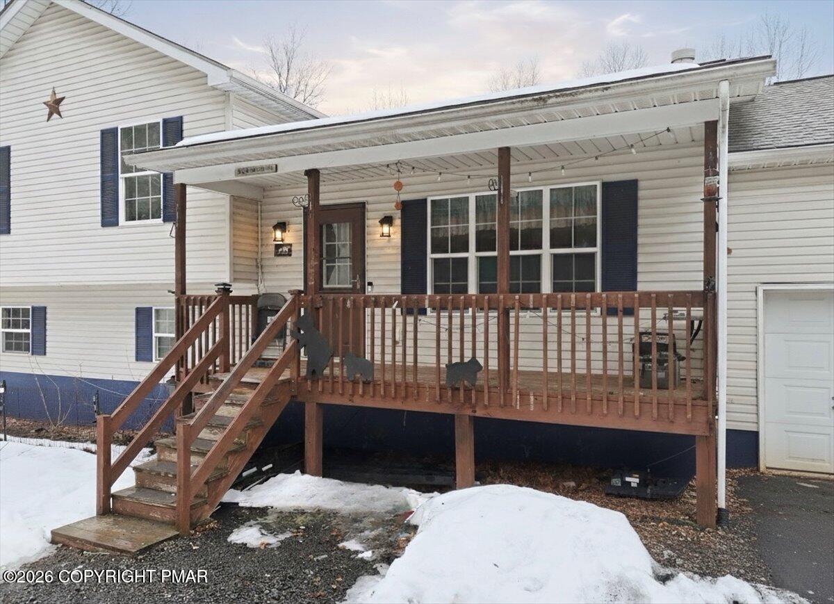 199 Magic Mountain Road Henryville, PA 18332 - Photo 4 of 74 a front view of a house with a yard