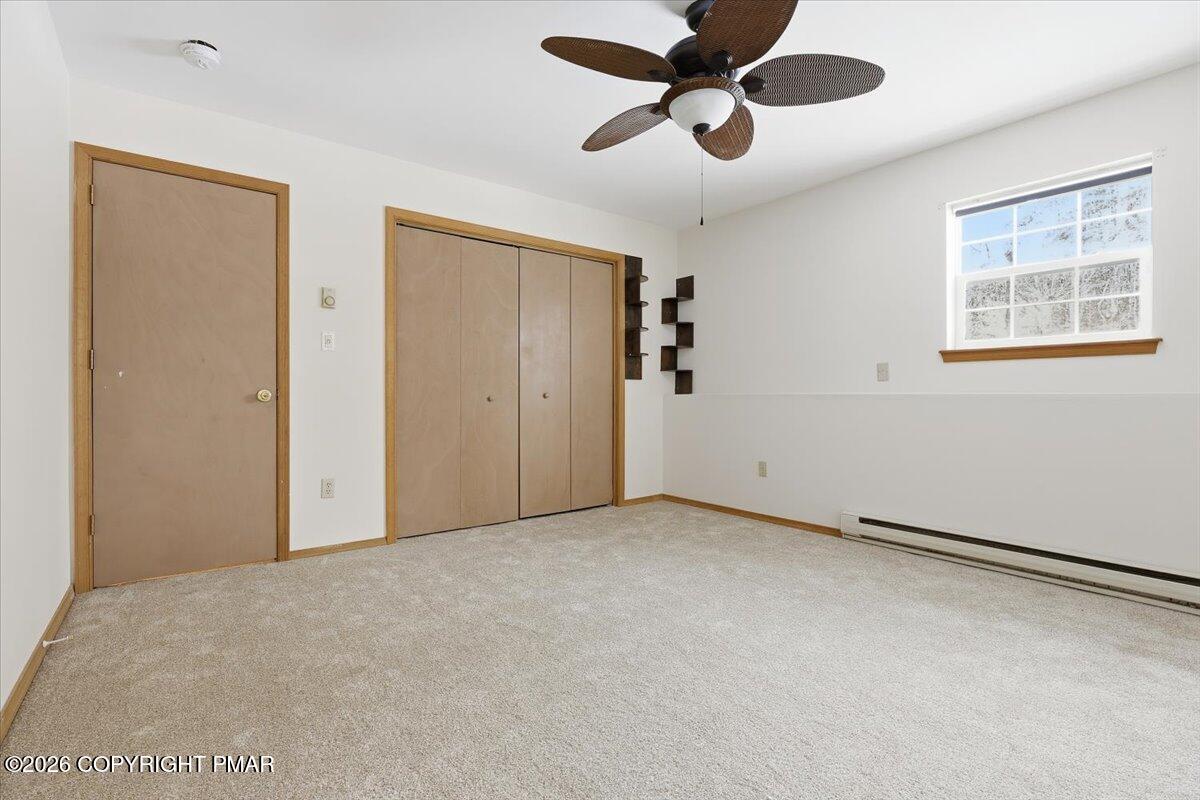 199 Magic Mountain Road Henryville, PA 18332 - Photo 47 of 74 a view of an empty room with a window