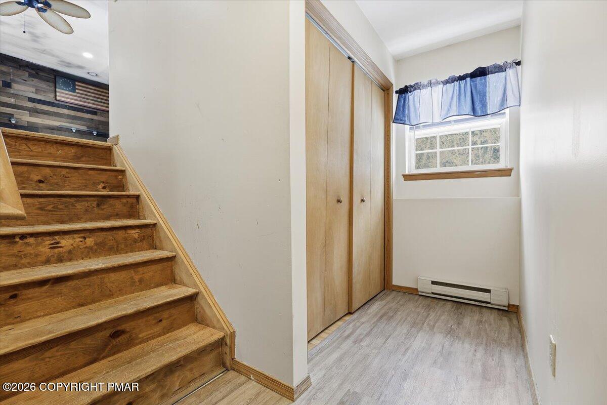 199 Magic Mountain Road Henryville, PA 18332 - Photo 52 of 74 a view of entryway and hall with wooden floor