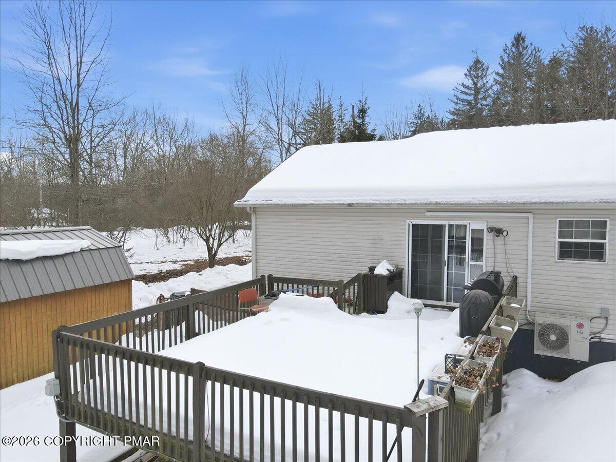199 Magic Mountain Road Henryville, PA 18332 - Photo 60 of 74 a view of a patio with furniture