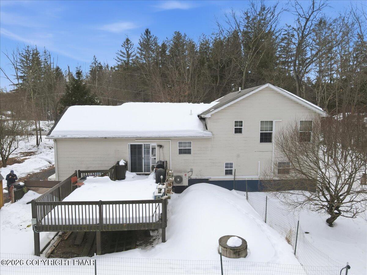 199 Magic Mountain Road Henryville, PA 18332 - Photo 62 of 74 a front view of a house with a yard