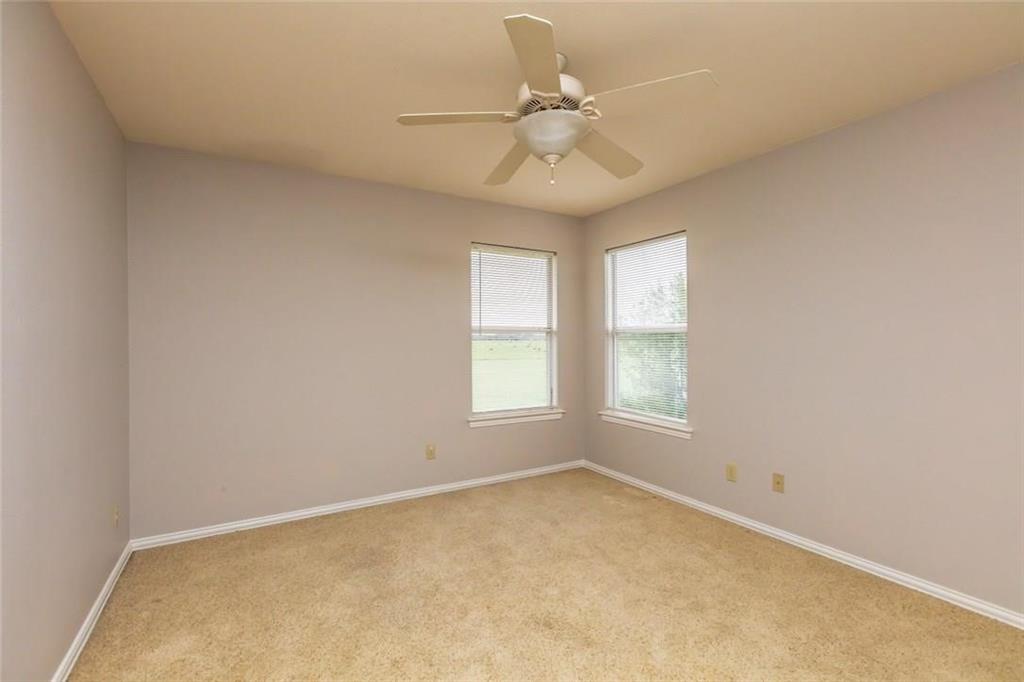 123 Double Tree Lane Lipan, TX 76462 - Photo 25 of 25 This bedroom overlooks the back yard.