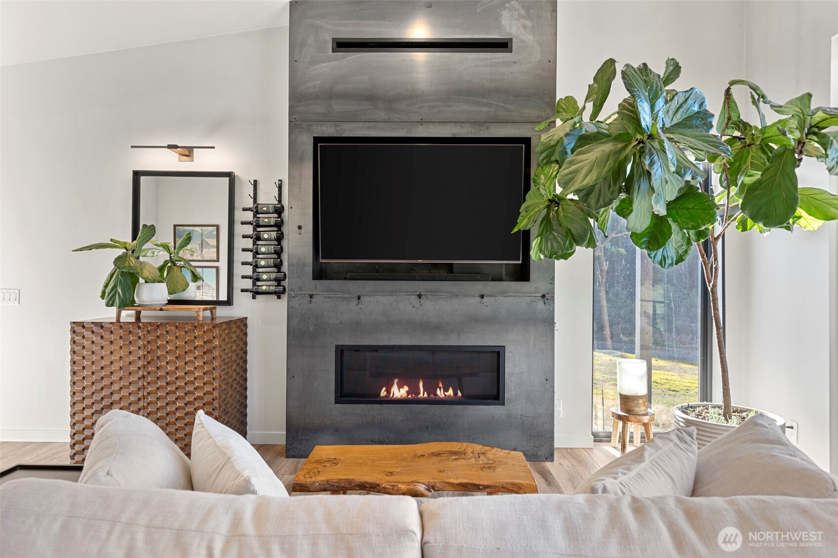 10695 Eagle Creek Road Leavenworth, WA 98826 - Photo 12 of 39 a living room with furniture and a fireplace