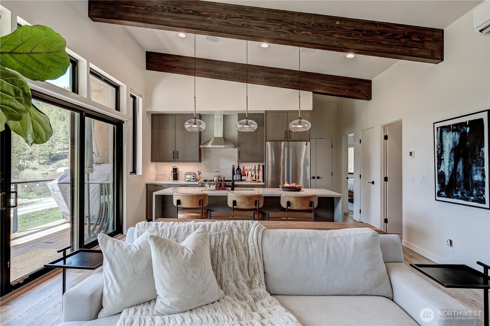 10695 Eagle Creek Road Leavenworth, WA 98826 - Photo 13 of 39 a living room with furniture and large windows