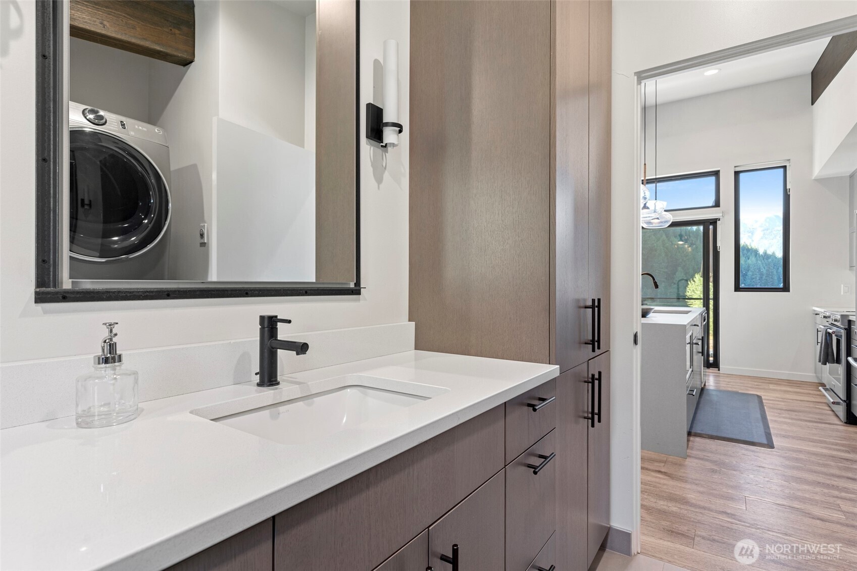 10695 Eagle Creek Road Leavenworth, WA 98826 - Photo 21 of 39 a en suite bathroom with a sink and a mirror