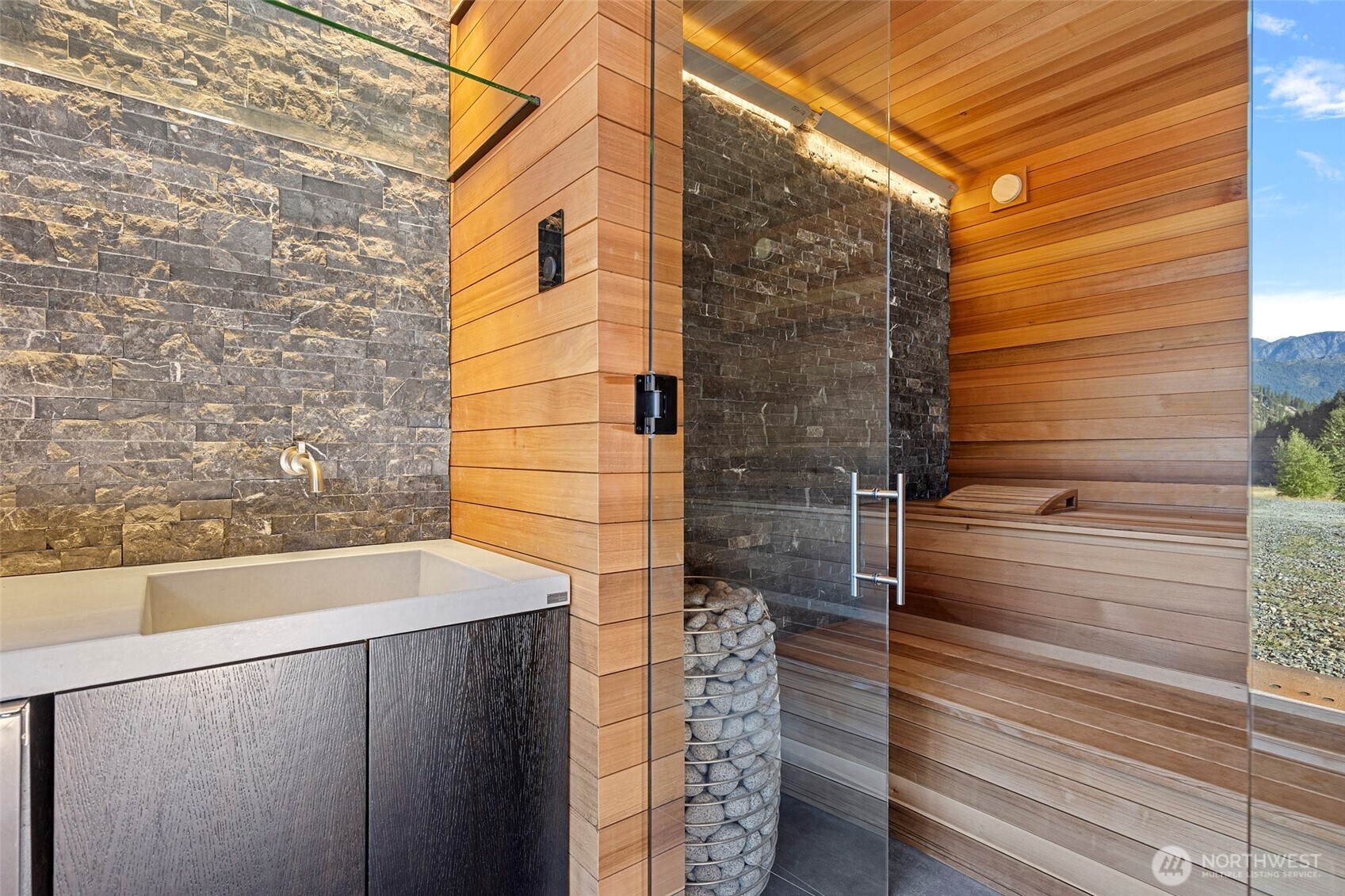 10695 Eagle Creek Road Leavenworth, WA 98826 - Photo 31 of 39 a bathroom with a shower and a sink