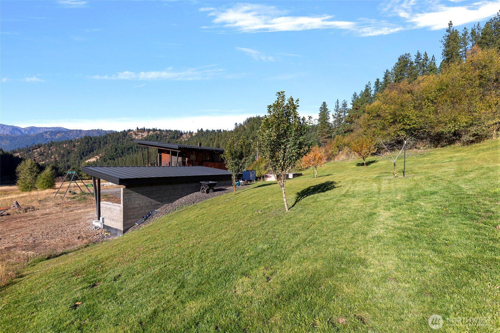 10695 Eagle Creek Road Leavenworth, WA 98826 - Photo 33 of 39 a view of a house with a yard