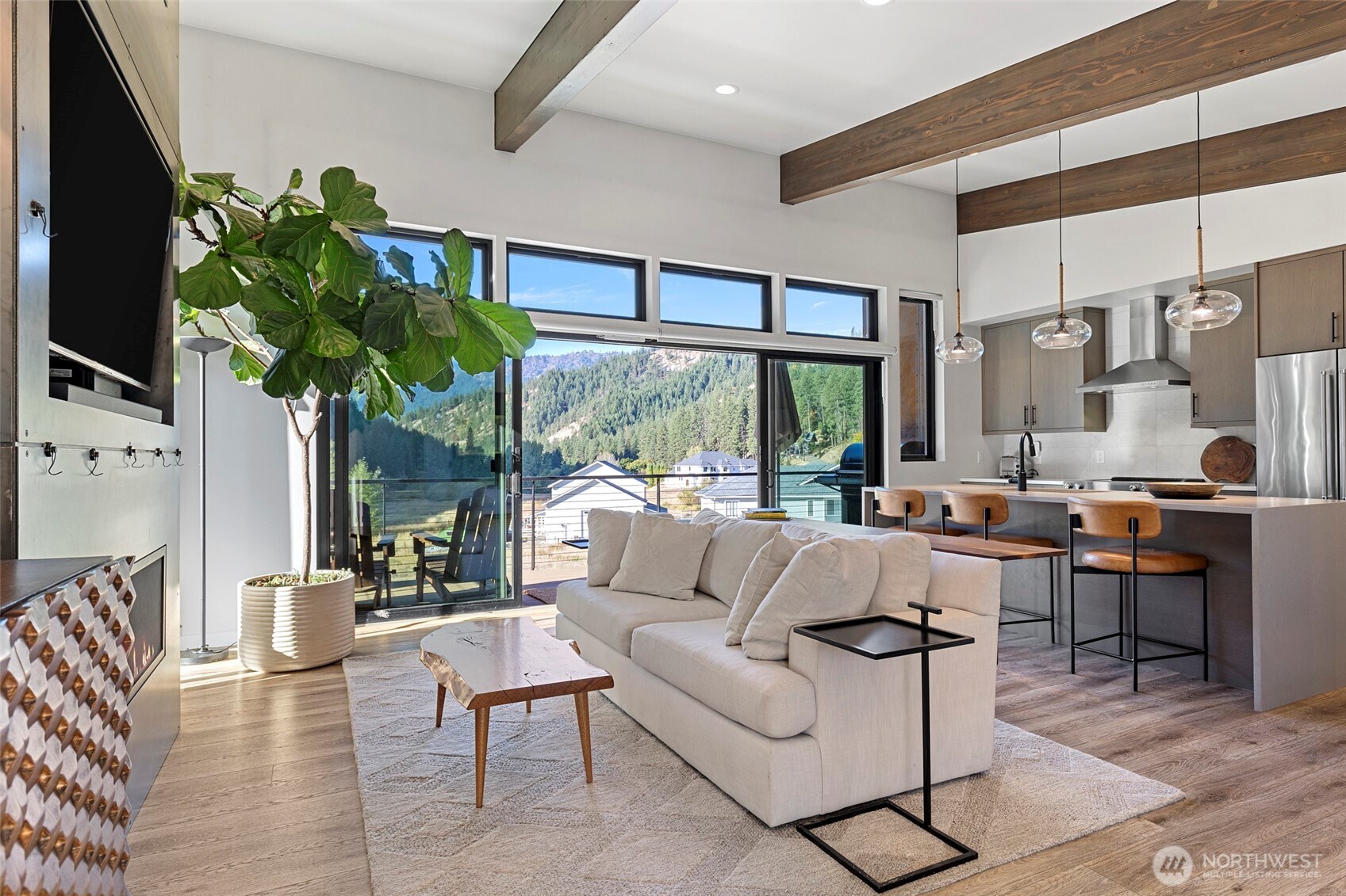 10695 Eagle Creek Road Leavenworth, WA 98826 - Photo 6 of 39 a living room with furniture a large window with outer view
