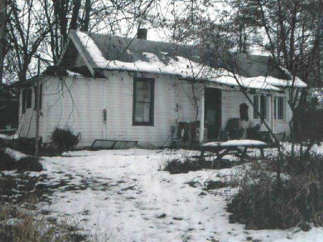 11306 Hackett Road Yakima, WA 98903 - Photo 1 of 4 a view of a house with a yard covered with snow