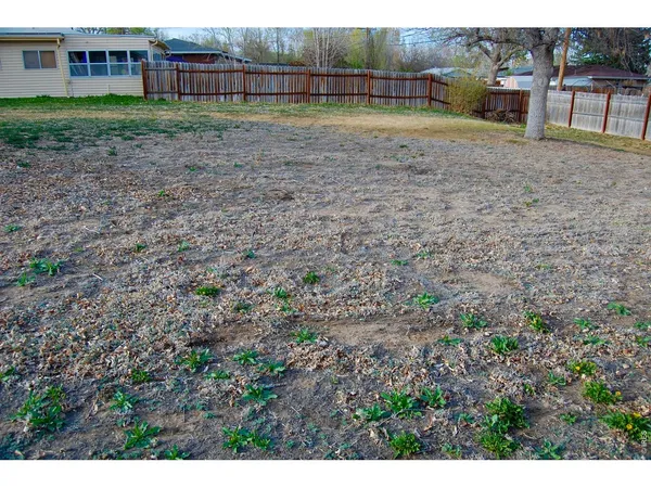 a view of backyard with outdoor space