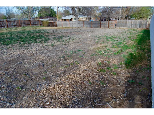 a view of a yard with an outdoor space