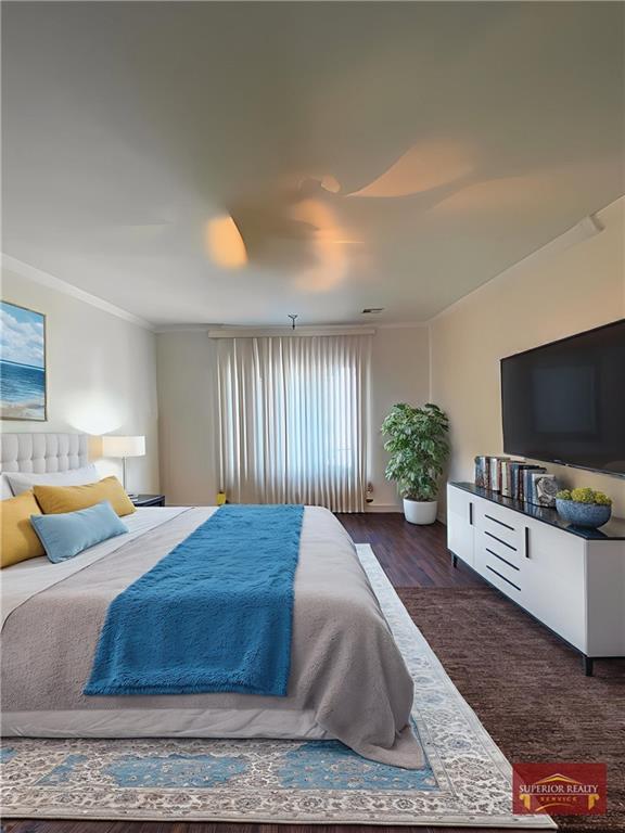 34 Amherst Street Brooklyn, NY 11235 - Photo 15 of 47 a bedroom with a bed and a flat screen television