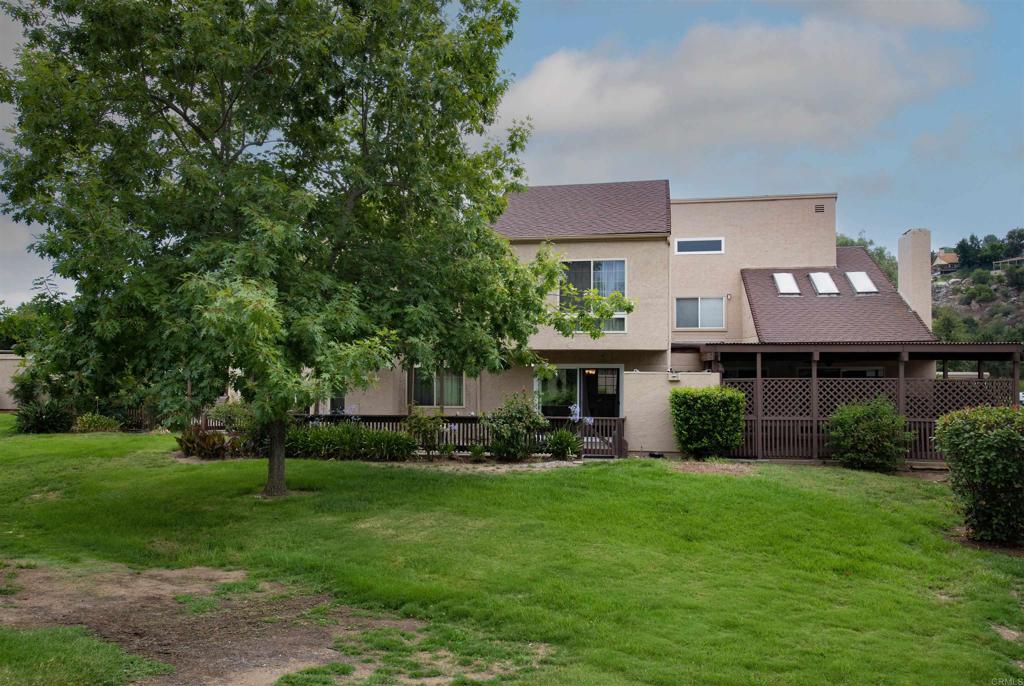 23622 Country Villa Road Ramona, CA 92065 - Photo 1 of 1 a front view of a house with a garden and trees