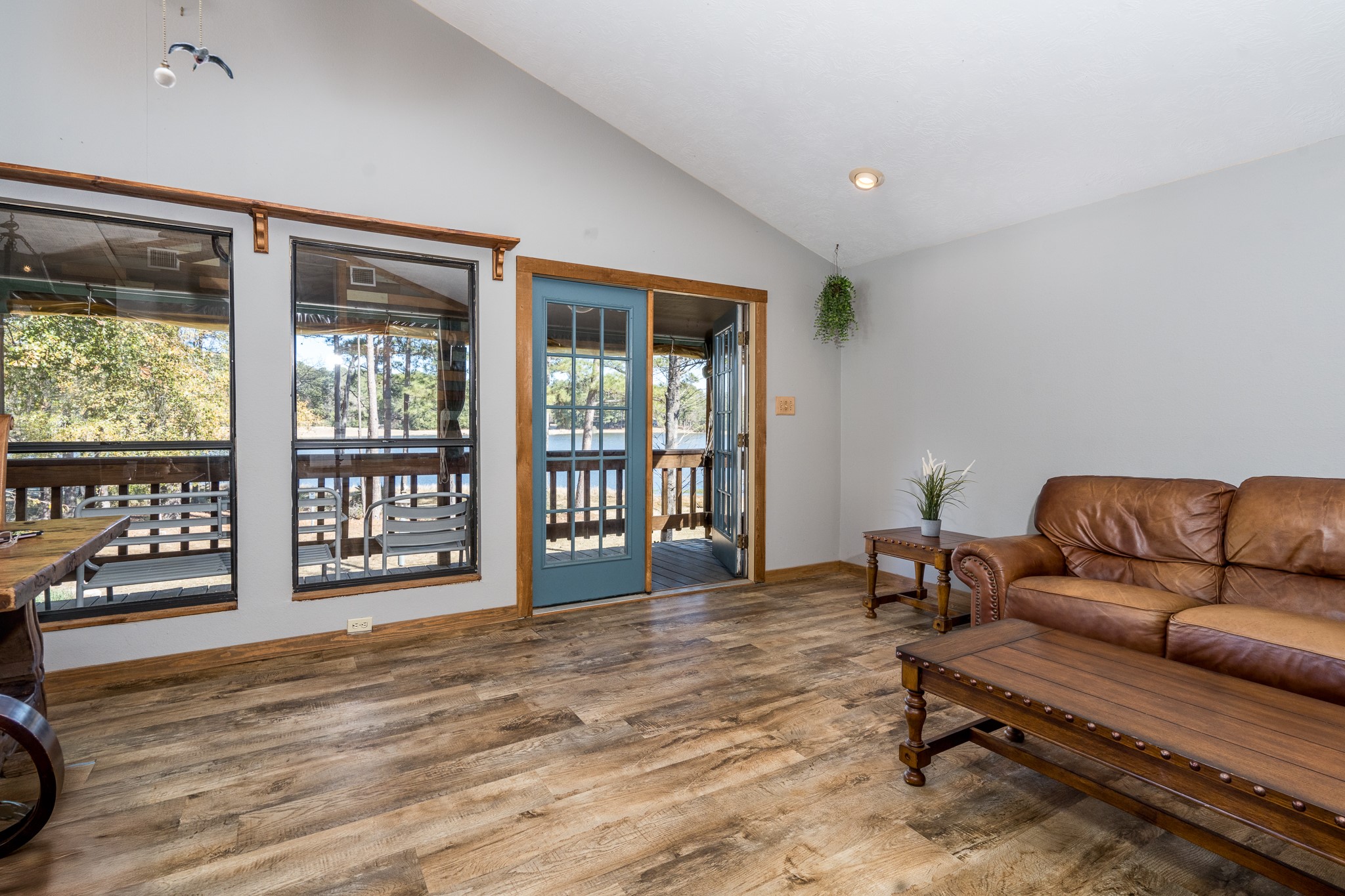 97 Greenway Drive Trinity, TX 75862 - Photo 13 of 49 a living room with furniture and a floor to ceiling window