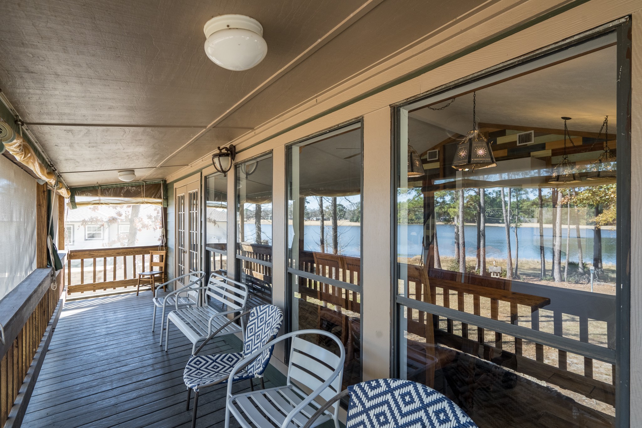 97 Greenway Drive Trinity, TX 75862 - Photo 15 of 49 a view of a porch with chairs and backyard