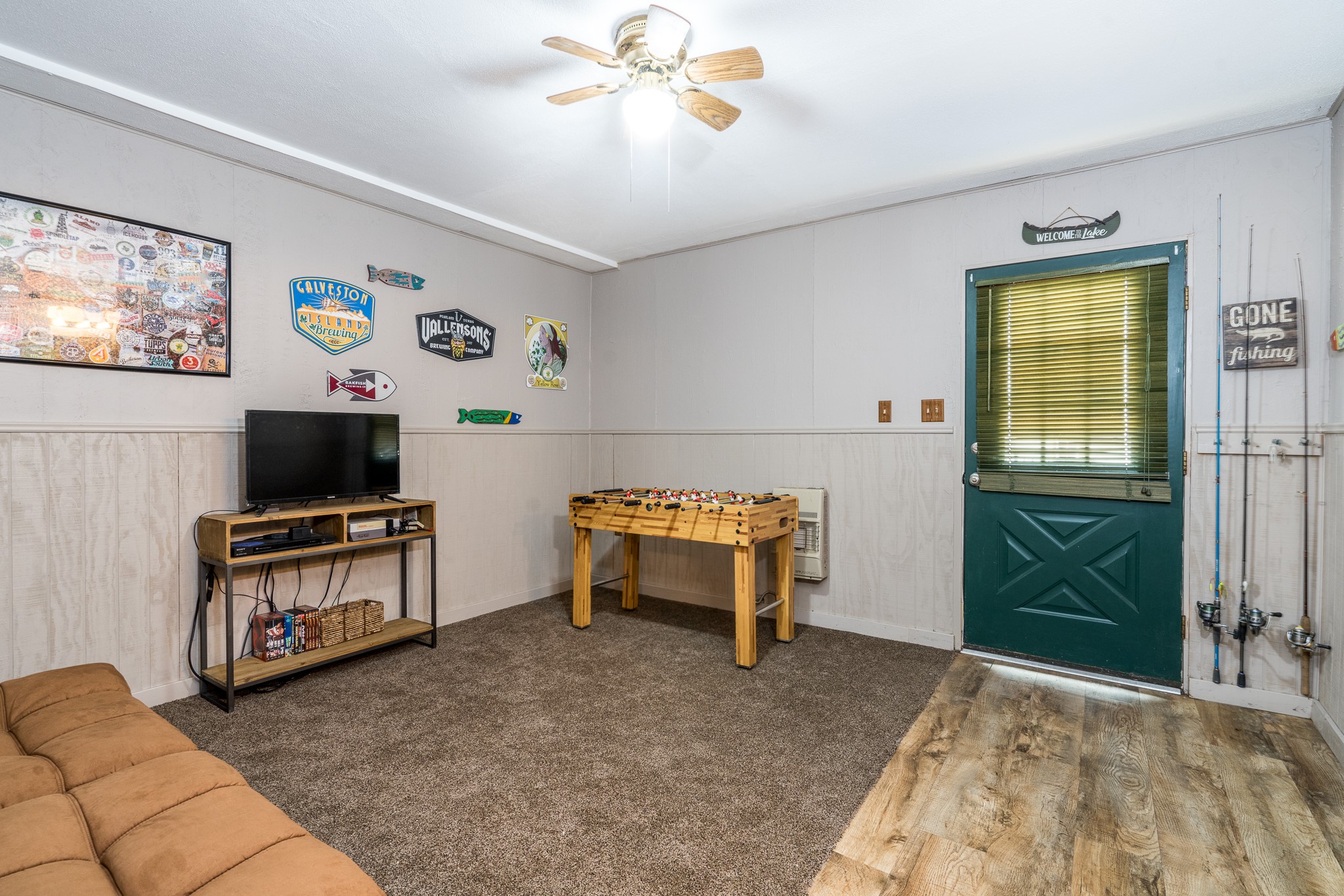 97 Greenway Drive Trinity, TX 75862 - Photo 34 of 49 a living room with furniture and a flat screen tv