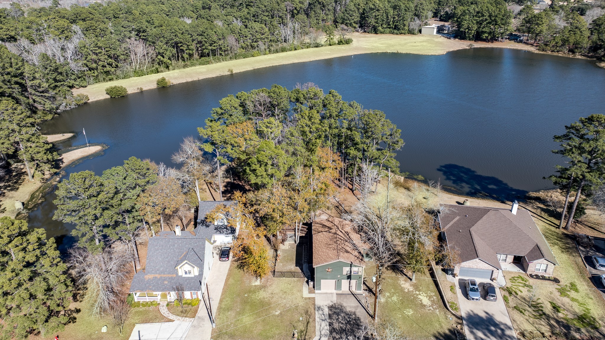 97 Greenway Drive Trinity, TX 75862 - Photo 4 of 49 an aerial view of a house a yard and lake view