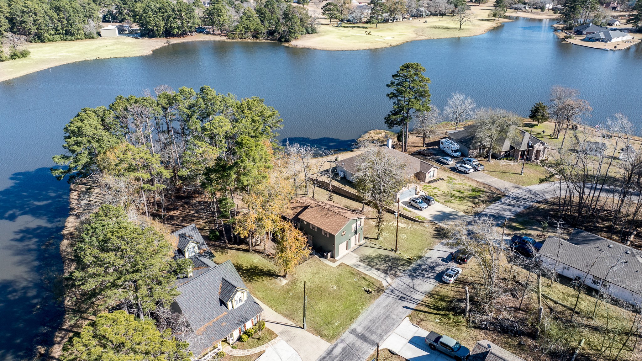 97 Greenway Drive Trinity, TX 75862 - Photo 43 of 49 an aerial view of a house with a yard and lake view