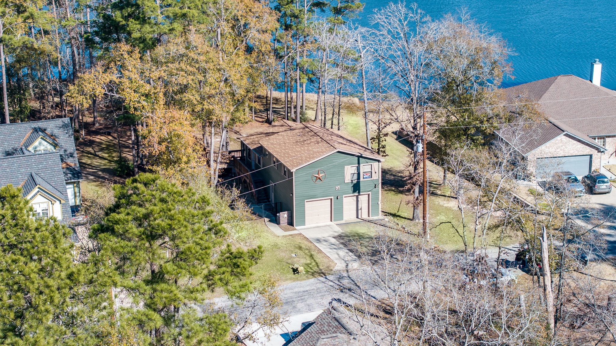 97 Greenway Drive Trinity, TX 75862 - Photo 44 of 49 a house that has a tree in front of it