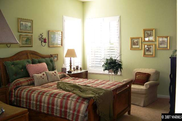 1635 Arboleda Drive Reno, NV 89521 - Photo 6 of 9 a bedroom with bed and window