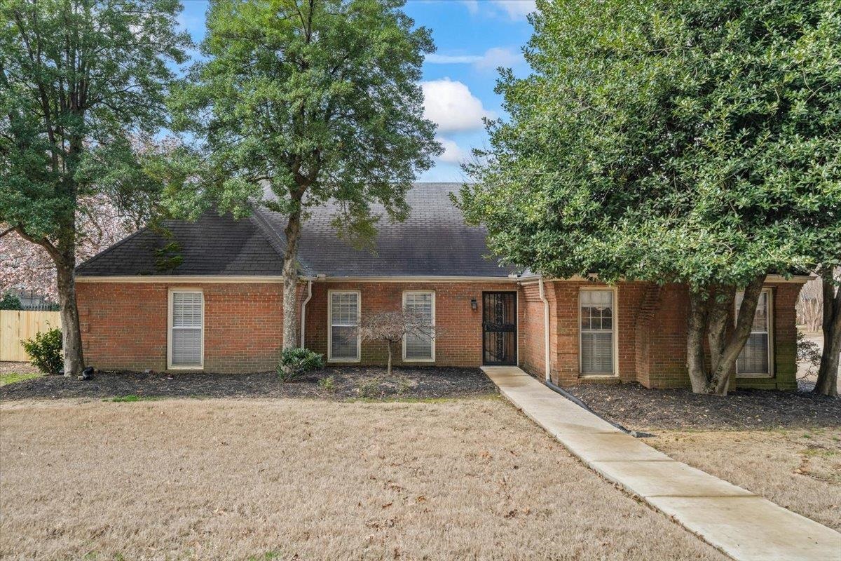 2587 McVay Road Memphis, TN 38119 - Photo 1 of 35 Ranch-style home with brick siding and a shingled roof