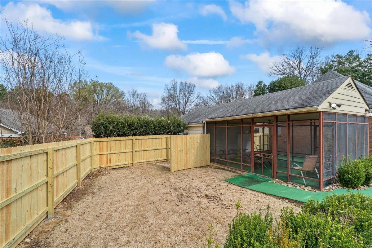 2587 McVay Road Memphis, TN 38119 - Photo 28 of 35 Fenced backyard with a sunroom