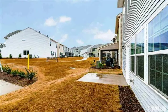 a view of a house with a swimming pool