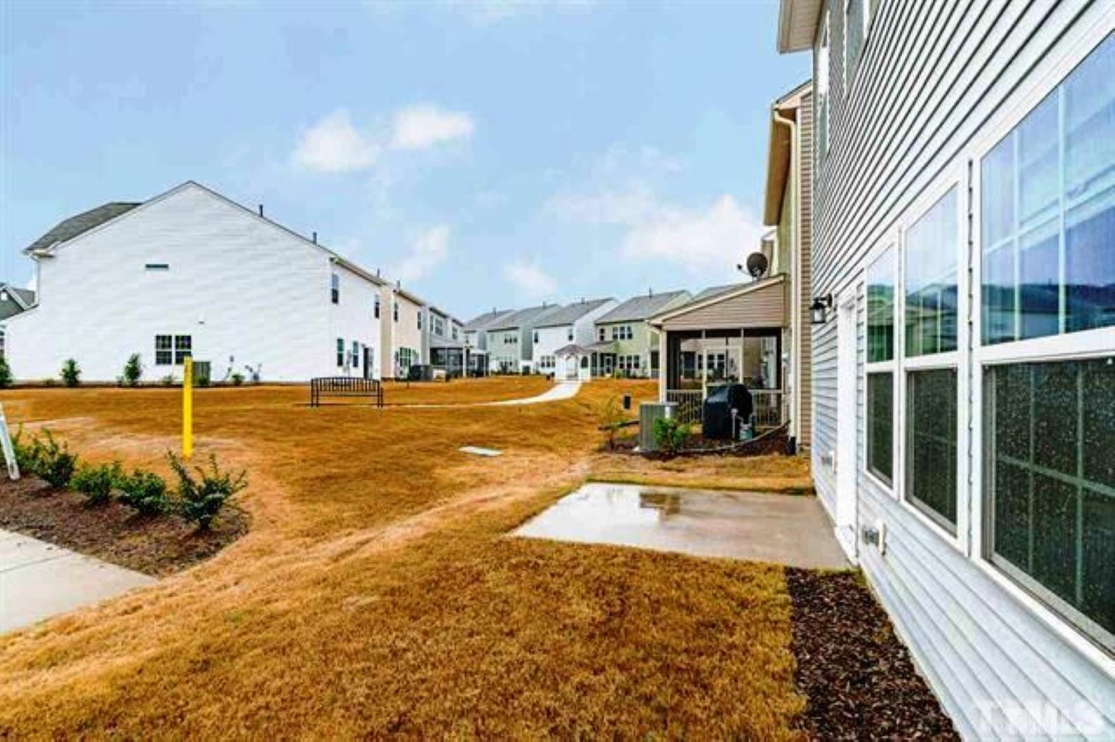 1118 Epiphany Road Morrisville, NC 27560 - Photo 19 of 20 a view of a house with a swimming pool