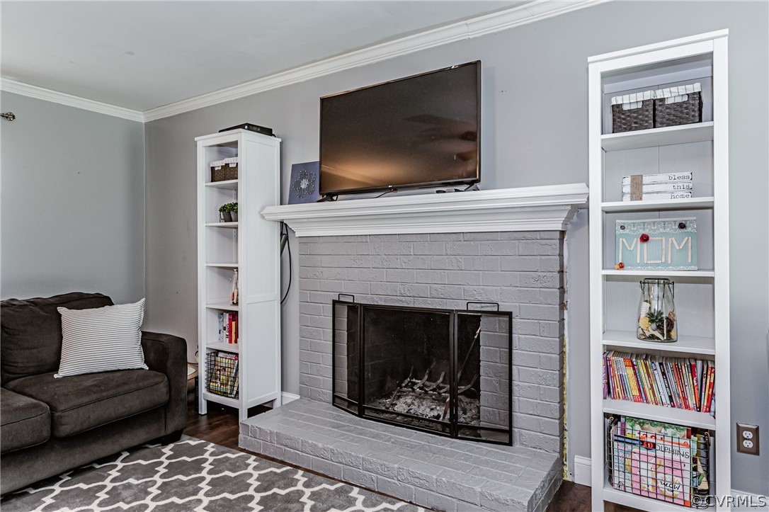 5018 Rollingway Road Chesterfield, VA 23832 - Photo 12 of 49 a living room with furniture and a fireplace