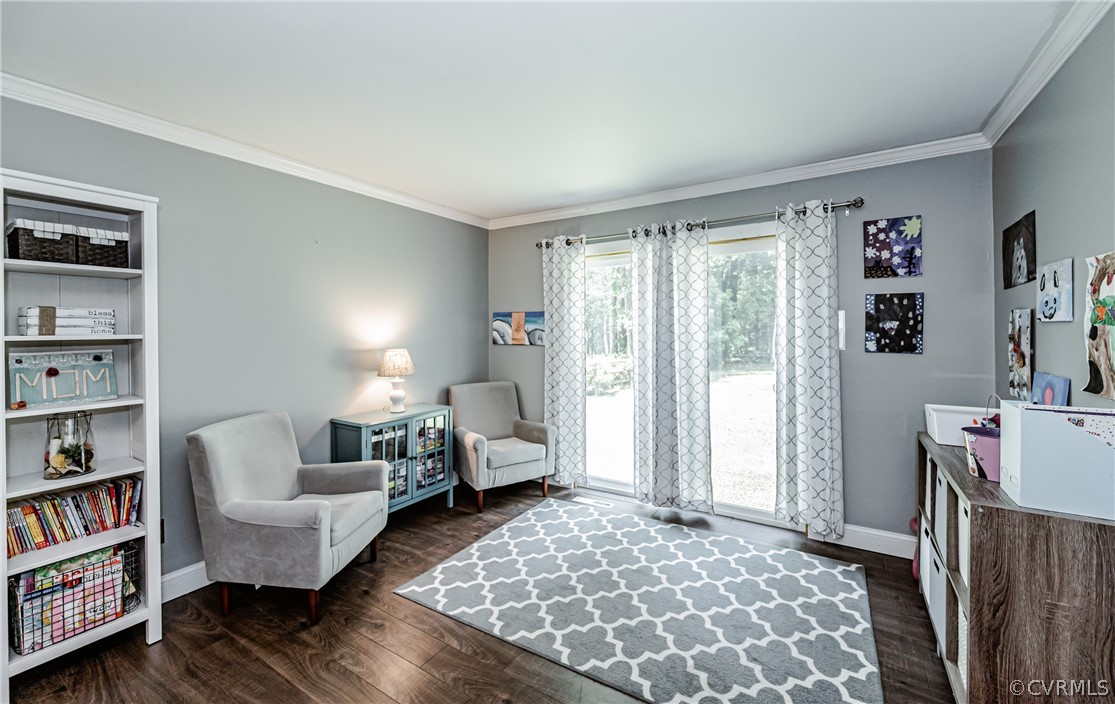 5018 Rollingway Road Chesterfield, VA 23832 - Photo 13 of 49 a bedroom with furniture and a book shelf