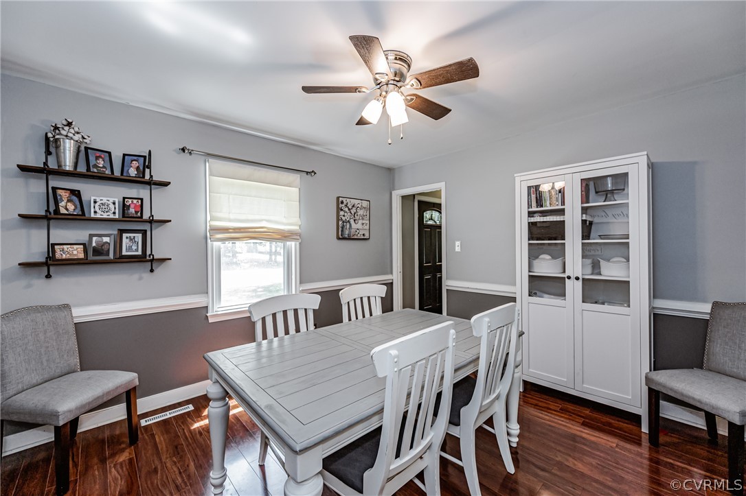 5018 Rollingway Road Chesterfield, VA 23832 - Photo 28 of 49 a view of a dining room with furniture window and wooden floor