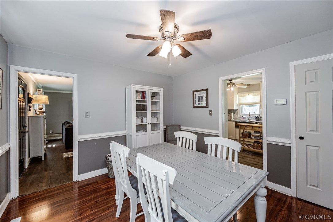 5018 Rollingway Road Chesterfield, VA 23832 - Photo 30 of 49 a view of a dining room with furniture and wooden floor