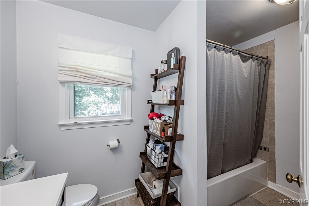 5018 Rollingway Road Chesterfield, VA 23832 - Photo 36 of 49 a view of a hallway with bathroom and wooden floor
