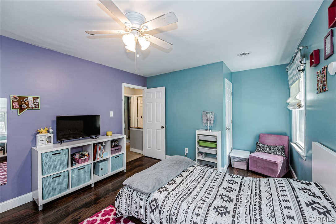 5018 Rollingway Road Chesterfield, VA 23832 - Photo 39 of 49 a bedroom with a bed and a flat screen tv