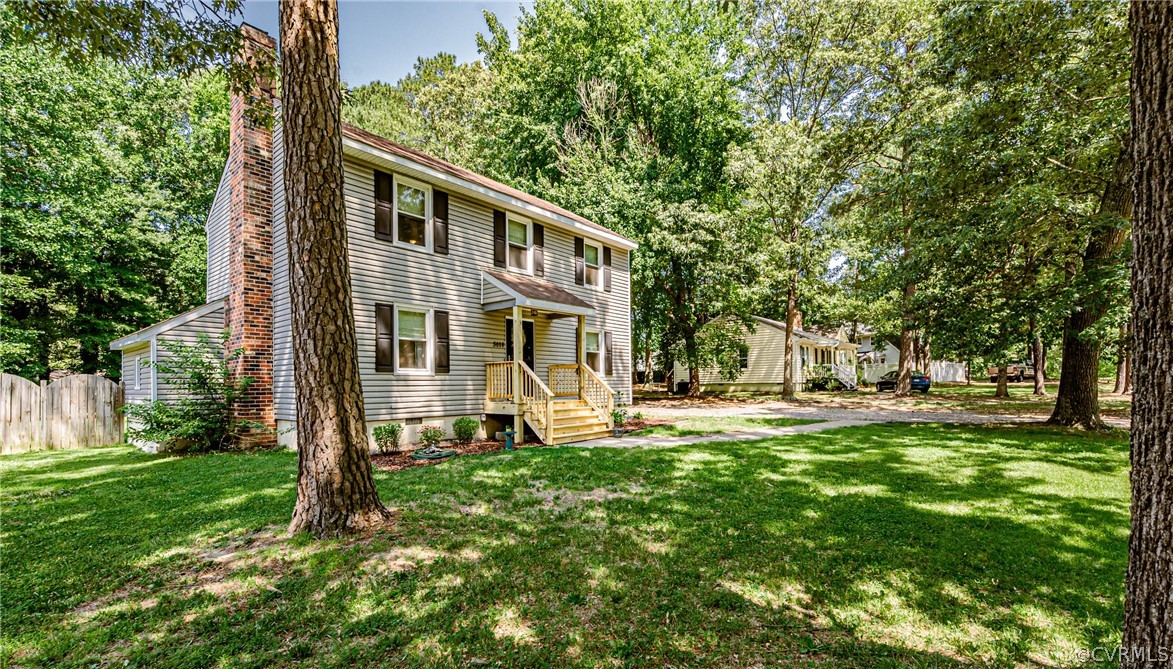 5018 Rollingway Road Chesterfield, VA 23832 - Photo 4 of 49 front view of a house with a yard