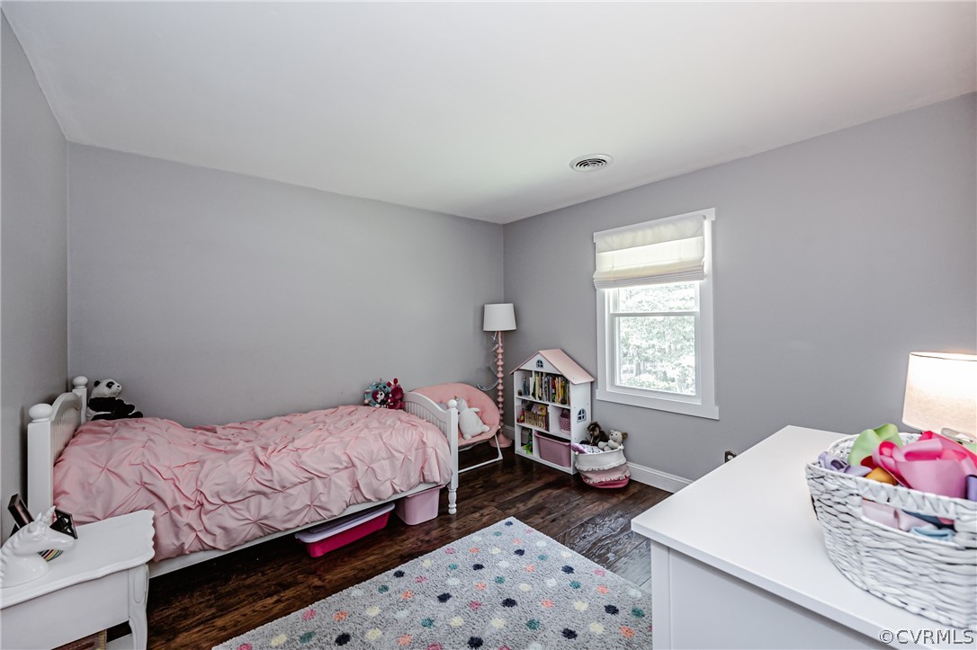 5018 Rollingway Road Chesterfield, VA 23832 - Photo 41 of 49 a bedroom with a bed and a window