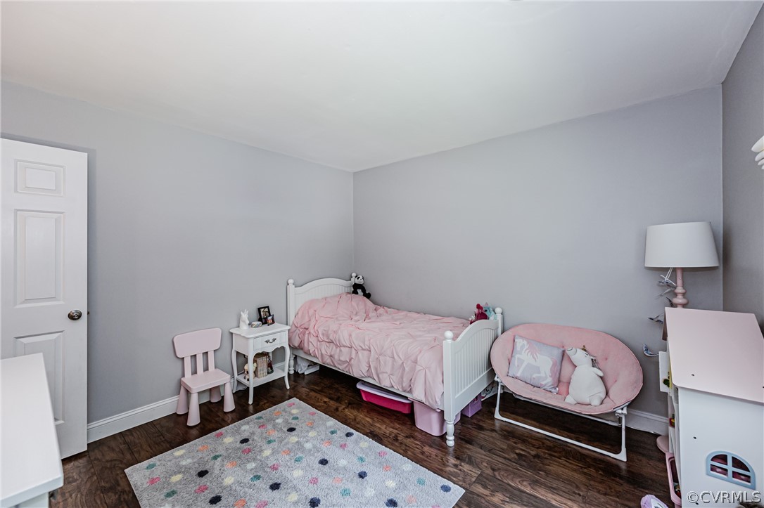 5018 Rollingway Road Chesterfield, VA 23832 - Photo 42 of 49 a bed room with a bed and a table