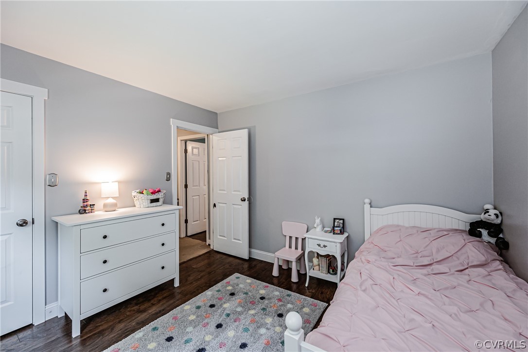 5018 Rollingway Road Chesterfield, VA 23832 - Photo 43 of 49 a bedroom with a bed and a dresser in it