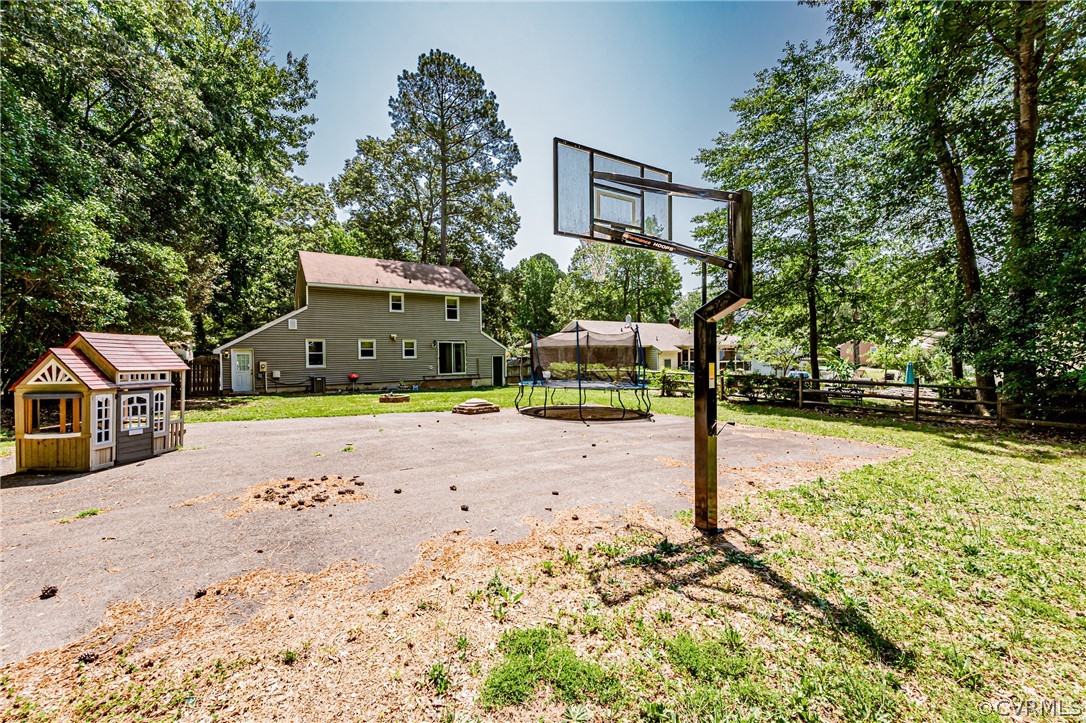 5018 Rollingway Road Chesterfield, VA 23832 - Photo 47 of 49 a front view of a house with a yard