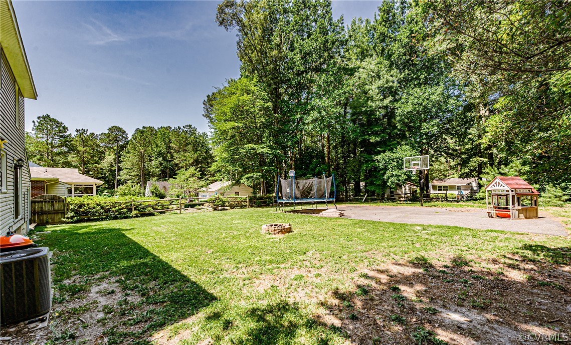 5018 Rollingway Road Chesterfield, VA 23832 - Photo 48 of 49 a view of a backyard with swimming pool