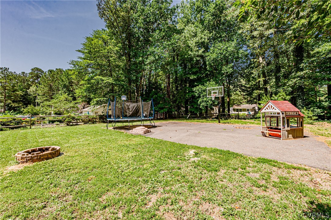 5018 Rollingway Road Chesterfield, VA 23832 - Photo 49 of 49 a view of a backyard with swimming pool