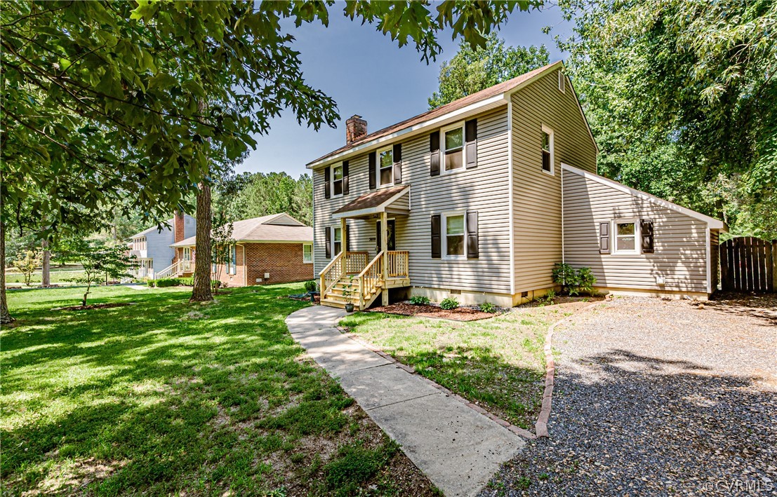 5018 Rollingway Road Chesterfield, VA 23832 - Photo 6 of 49 a view of a house with backyard and trees