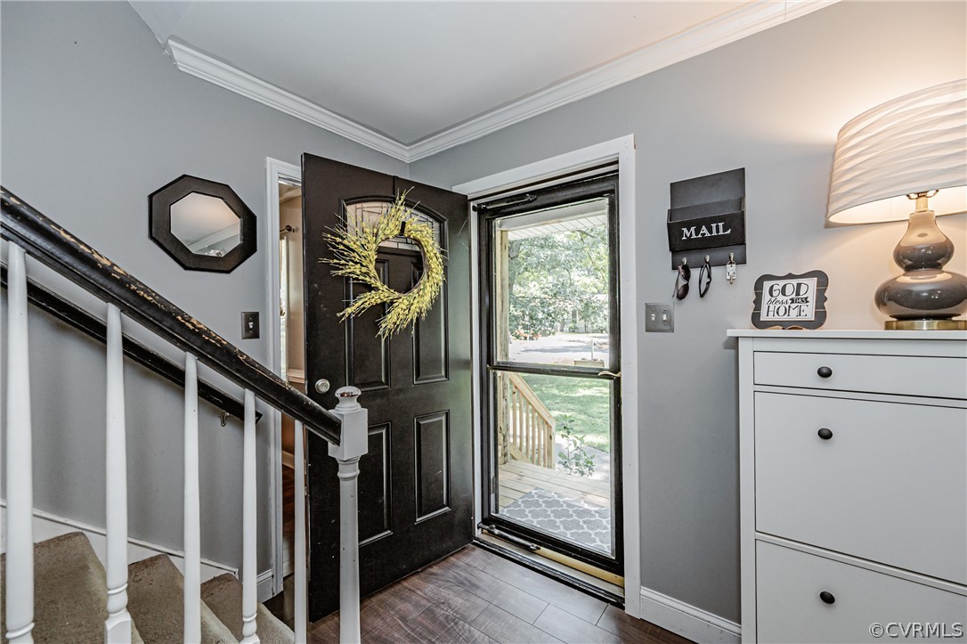 5018 Rollingway Road Chesterfield, VA 23832 - Photo 8 of 49 a view of entryway and hall with wooden floor