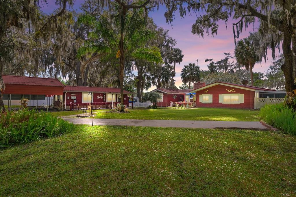 101 Orange Street Satsuma, FL 32189 - Photo 1 of 65 a view of a house with a big yard